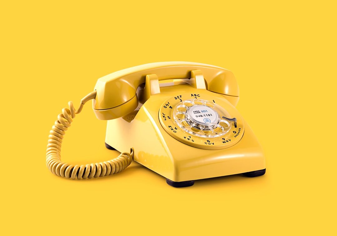 yellow rotary telephone